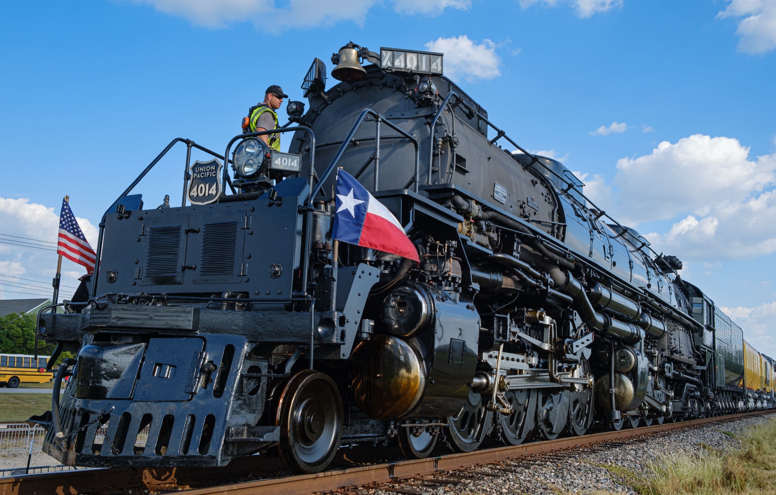 Union Pacific Big Boy No. 4014 steam locomotive, front three-quarter view with American and Texas flags on the pilot